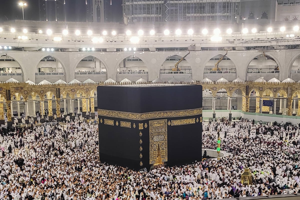 Pilgrims circumambulating the Kaaba at Masjid al-Haram in Makkah