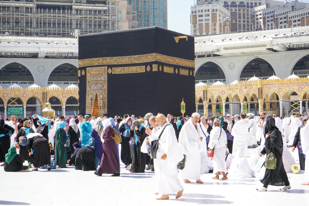 The Kaaba at Masjid al-Haram — pilgrims at Arafah